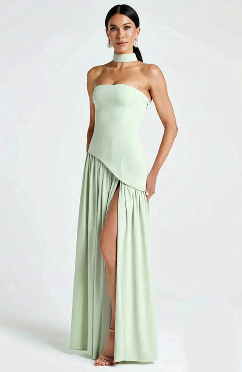 Un vestido sofisticado en un delicado tono verde pistacho que aporta frescura, luminosidad y un toque moderno. Perfecto para destacar con estilo y elegancia en cualquier ocasión.